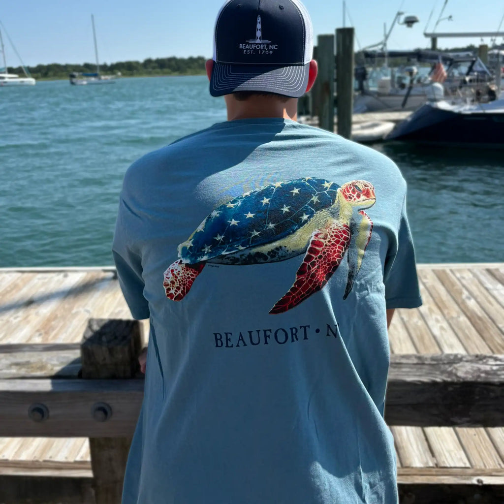 Sea Turtle THE GENERAL STORE Logo Adult T-Shirt, back view, worn by a model