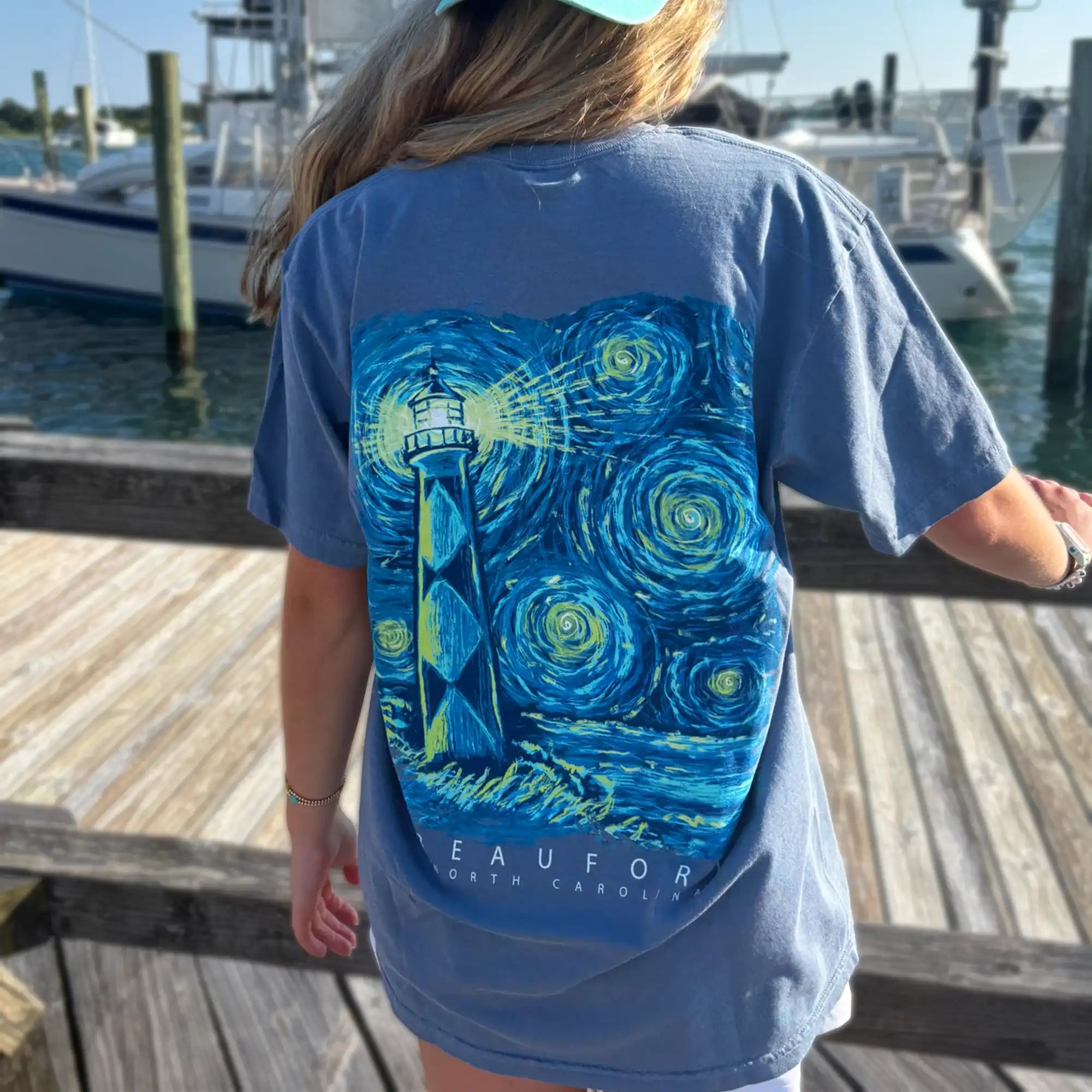 Starry Night Cape Lookout Beaufort, NC Adult Tee in Blue Jean, back view, worn by a model